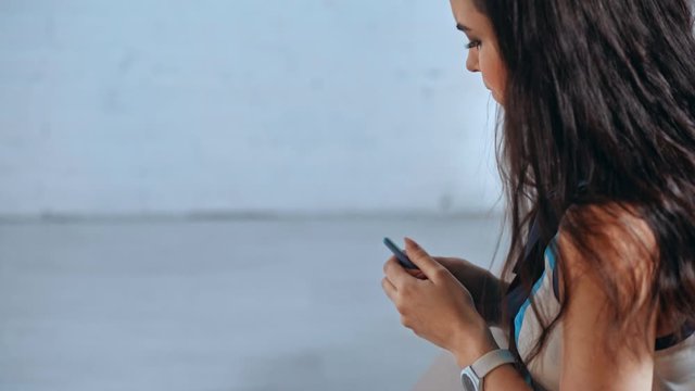 stressed young woman holding pregnancy test