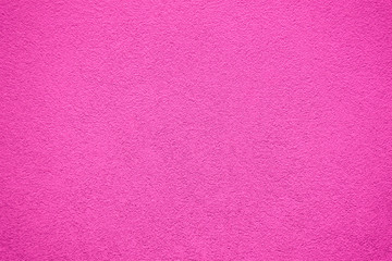 Pink painted wall. Old colored stone wall texture.