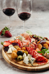 various snacks for wine cheese, salami, prosciutto