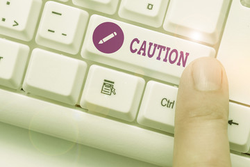 Handwriting text Caution. Conceptual photo Care taken to avoid danger or mistakes Warning sign...