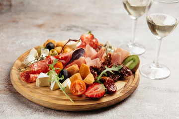 various snacks for wine cheese, salami, prosciutto