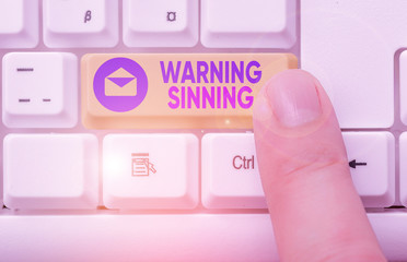 Conceptual hand writing showing Warning Sinning. Concept meaning stop the action which is believed...