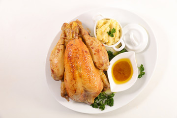 roasted chicken with mashed potato and sauce