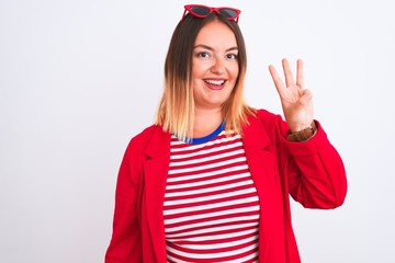 Young beautiful woman wearing striped t-shirt and jacket over isolated white background showing and pointing up with fingers number three while smiling confident and happy.