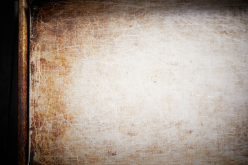 Naklejka premium Baking tray surface with scratches