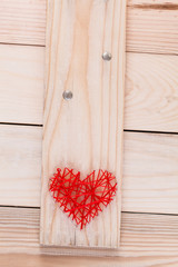 Heart of thread and carnations on a tree, creativity, February 14, lovers, interior decoration