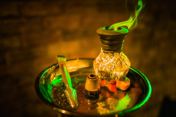 The process of burning shisha.
Strong close-ups, colorful frames with lots of smoke. The dynamics of sparks.