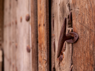 Detail of the doorknob or handle of an old vintage door - Natural revealed. Talavera de la Reina