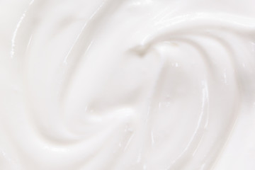 Fototapeta na wymiar Cream, yogurt texture. White dairy food swirl background
