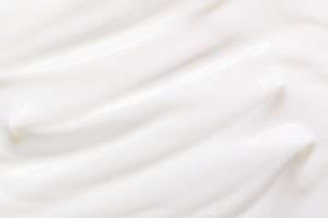 Sour cream, yogurt texture. White dairy food background