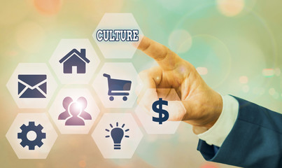 Conceptual hand writing showing Culture. Concept meaning characteristics and knowledge of a...