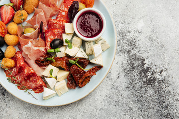 various snacks for wine cheese, salami, prosciutto