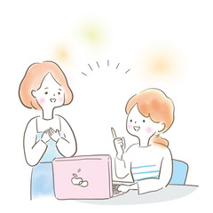 仲良くパソコン作業をしている女性達