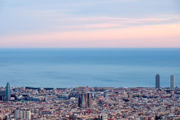 Panning shot of the city with a colorful sky, Barcelona