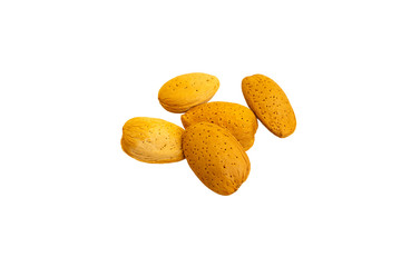 five unpeeled almonds on a white isolated background. about the benefits of nuts when losing weight