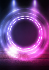 Dark abstract futuristic background. The geometric shape of the cyber circle in the middle of the scene. Neon blue-pink rays of light on a dark background