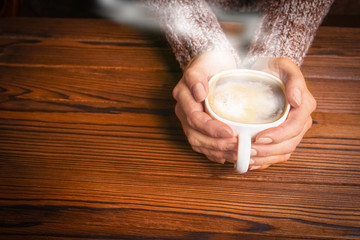 a female hands and coffee