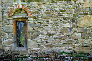 old door in stone wall
