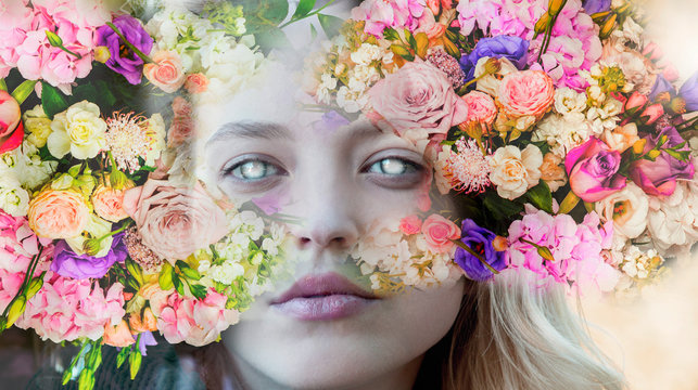 Artistic portrait of a witch in flowers with white eyes