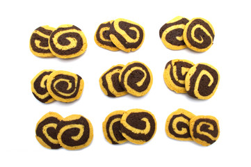Cookies in the shape of a spiral pattern isolated on a white background. Handmade biscuits.