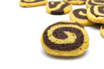 Cookies in the shape of a spiral pattern isolated on a white background. Handmade biscuits.