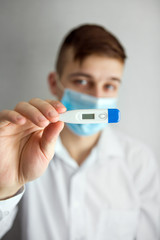 Young Man in Flu Mask