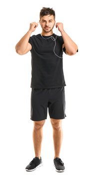 Sporty young man on white background