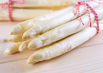 Fototapeta na wymiar New harvest of white asparagus, two bunches high quality raw asparagus in spring season, ready to cook