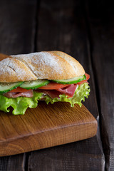 Close up sandwich on wood board