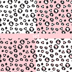 A set of cute patterns, with colors of wild exotic animals, on a white and pink background. Vector illustration for printing on fabric, wrapping paper, Wallpaper, postcard. 