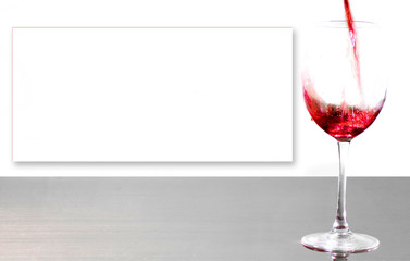 Glass with red wine and highlighted space for text. Copy space. Invitation, greeting card