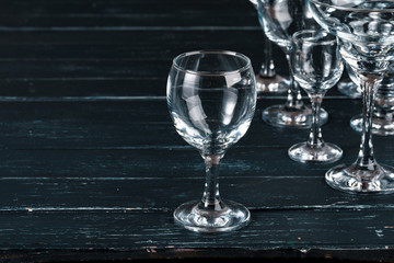 Empty  glasses for drinks on dark background