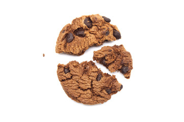 Chocolate chip cookies with some broken and crumbs isolated on white background in Top view.