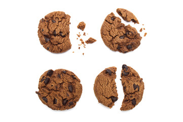 Chocolate chip cookies with some broken and crumbs isolated on white background in Top view.