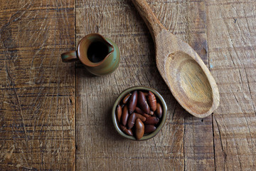 Baru chestnut on the rustic wooden table