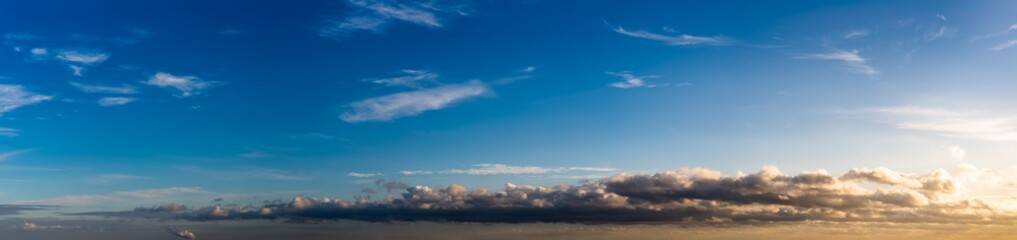 Fantastic dark thunderclouds at sunrise