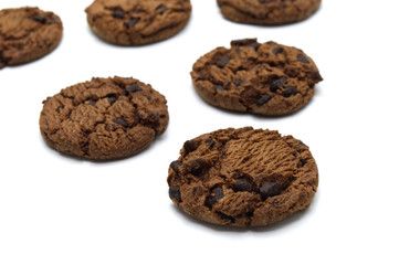 Chocolate chip cookies crunchy delicious sweet meal and useful biscuits isolated on white background. Homemade pastry.