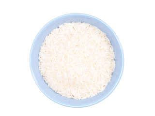 Indian long grain Basmati rice in blue ceramic bowl isolated on white. Indian cuisine, ayurveda, naturopathy concept