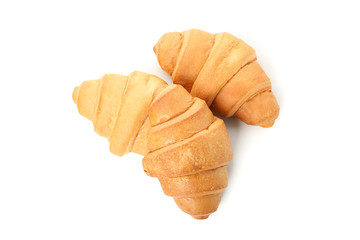 Freshly baked croissants isolated on white background