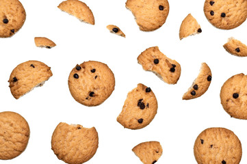 Chocolate chip cookies set cracked and crumbs isolated on white background. Sweet biscuits delicious and crunchy homemade pastry.