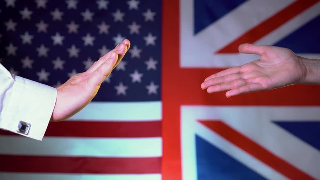 Great Britain reaches out America refuses to shake hands. Gap business, relations, policies between the UK and the United States. The conflict between the US and the UK
