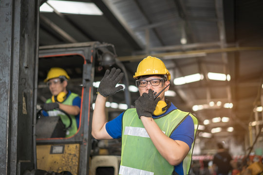 Engineers use radio to provide sound signals and flashing lights. When a forklift goes back to the factory for safety