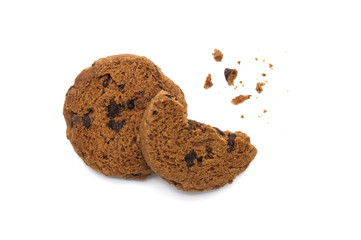 Chocolate chip cookies with crumbs on white background.