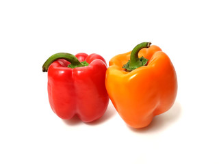 Red and orange peppers isolated on white background.