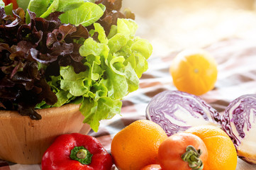 Fresh organic raw vegetable and fruit in bowl for salad on table, vegetarian and healthy food or ingredient and herb for cooking health with copy space, harvest for farm, nutrition concept.