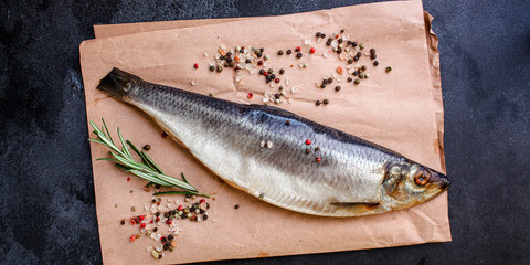 herring fish (healthy food, salted raw and spices) menu concept. food background. top view. copy space