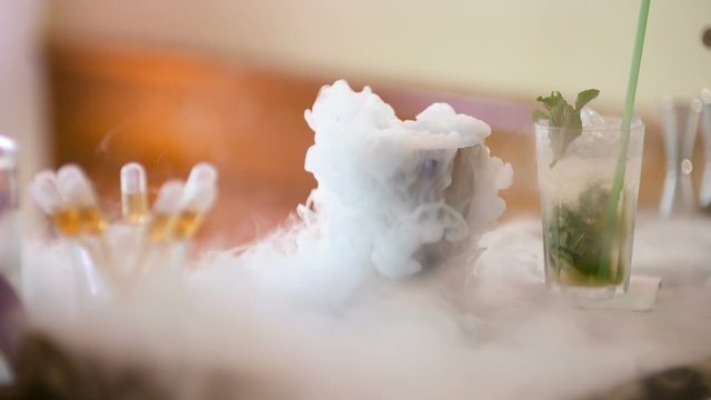 dry ice in glass at bar