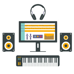 Home music studio equipment. Speakers, monitor, headphones and midi keyboard.