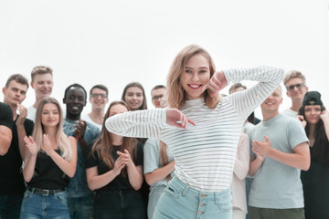 group of diverse young people applauding their leader