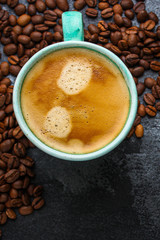 coffee drink and coffee grain (beverage, delicious hot drink). top view. copy space